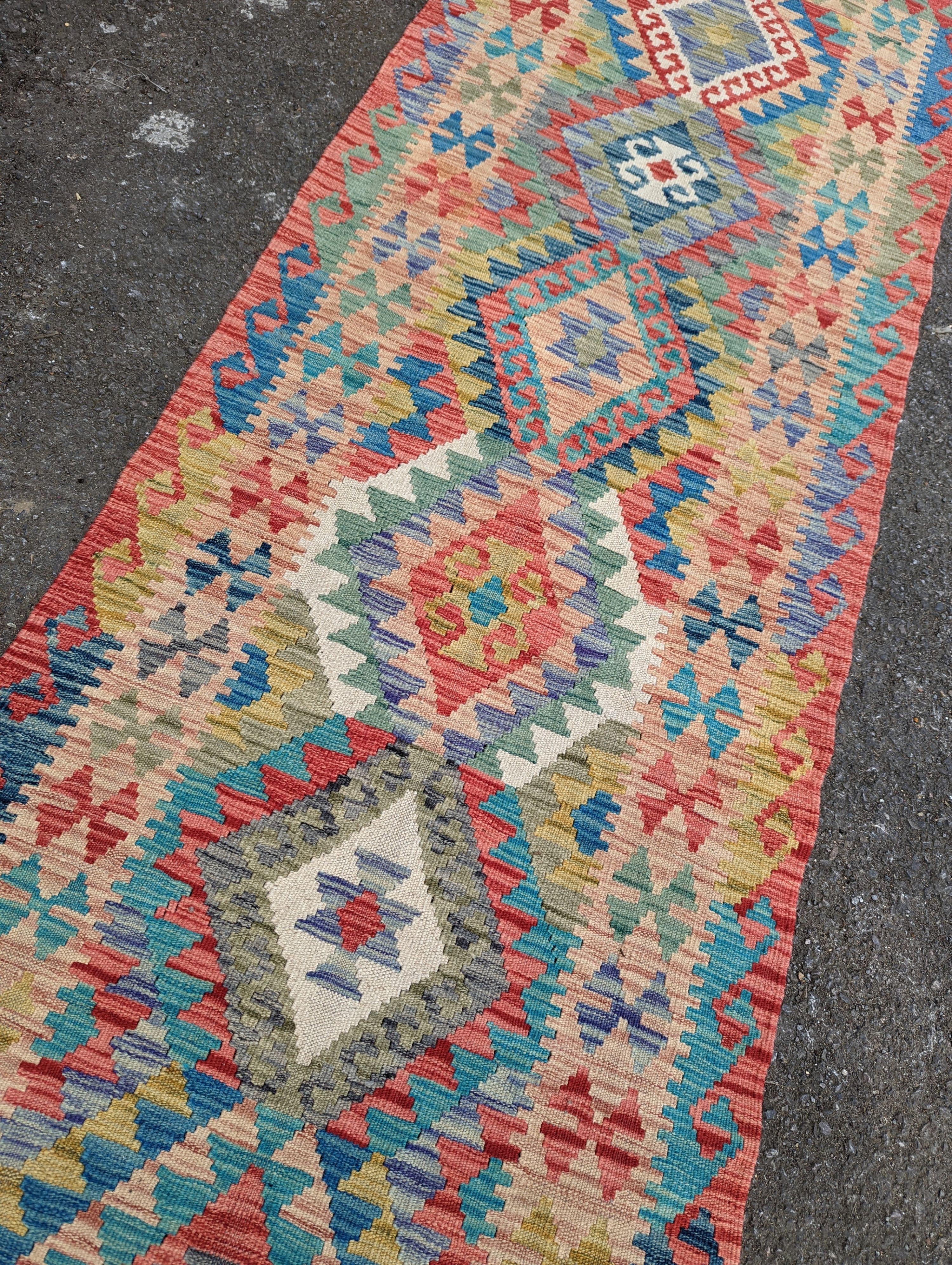 A contemporary Anatolian design Kilim flatweave runner, 290 x 85cm
